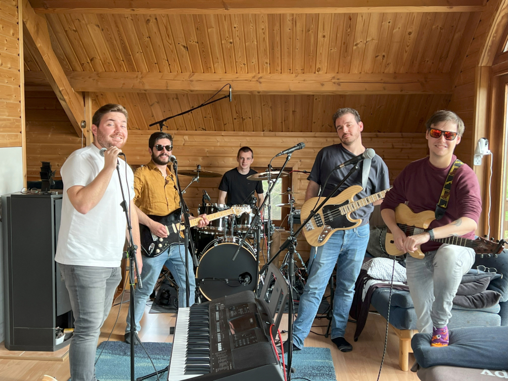 The band posing with their instruments